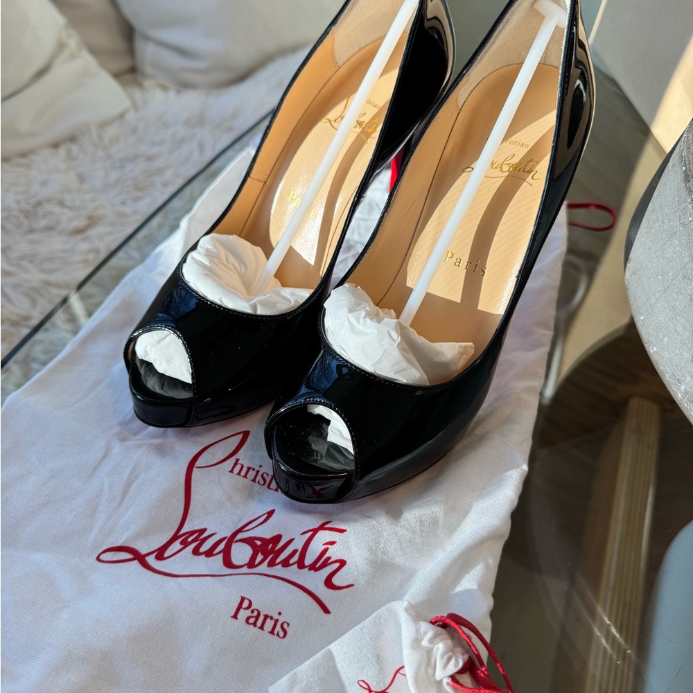 Christian Louboutin Black Peep-Toe Heels brand new never worn. OBO